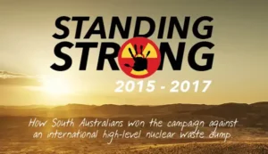 Standing Strong book cover, desert sumset and anti nuclear symbol