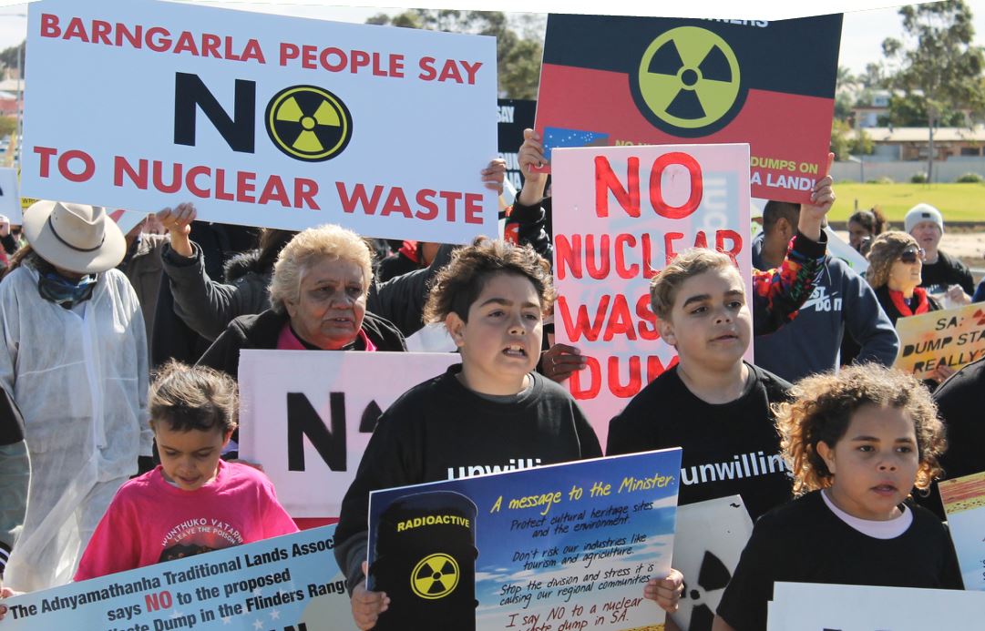 Photo of a group of people at a rally against nuclear waste.